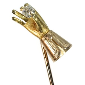 Antique Victorian tiepin gloved hand holding old cushion cut diamond